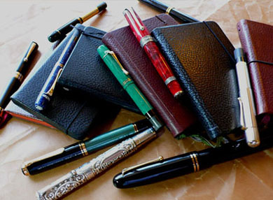 Leather-bound notebooks with pen